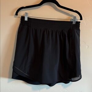 Lululemon black active wear skirt spandex shorts under and attached. EUC